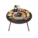 Utegrill med kol och tesetbord